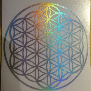 Holographic flower of life die-cut decal sticker in a rainbow circular design