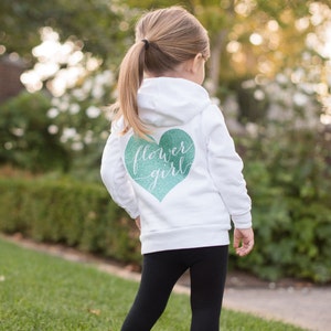 White flower girl hoodie with mint heart graphic on back, hood and front pocket