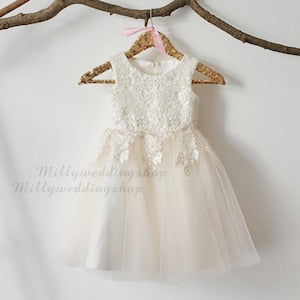 Ivory lace bodice flower girl dress with sleeveless tulle skirt
