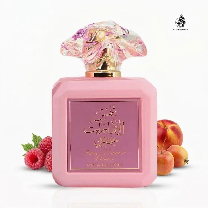 Women’s rose eau de parfum bottle, pink glass with gold cap