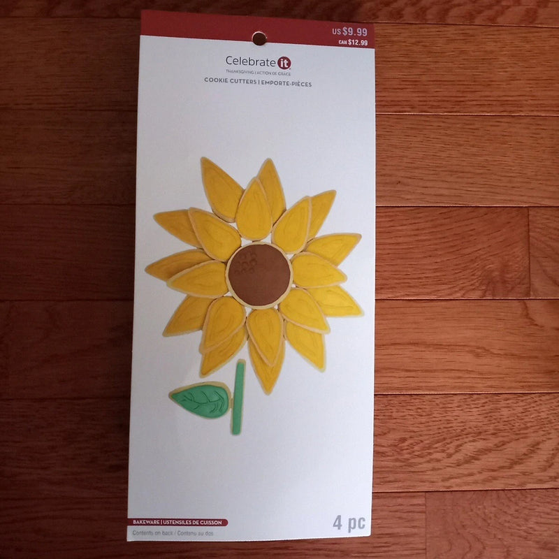 4-piece sunflower cookie cutter set with yellow flower and green leaf illustration on box