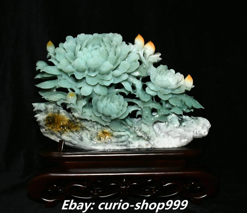 Jade peony flower carving statue on dark wood base, light green floral details