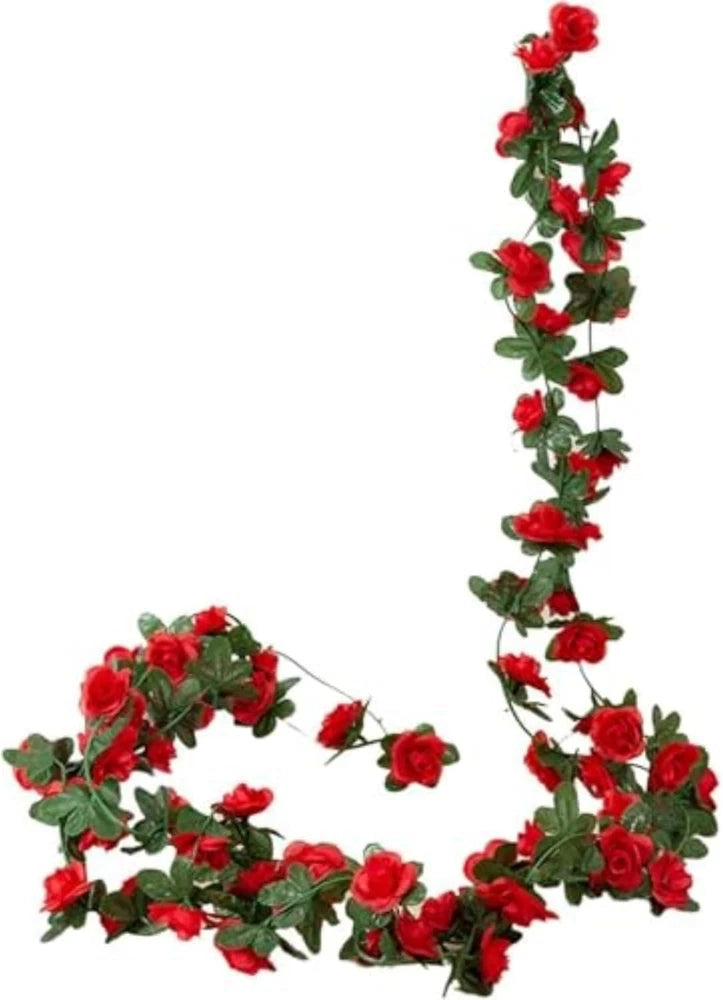 Artificial peony flower garland with red blossoms and green leaves on hanging vines