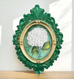 Vintage style oval framed mini white hydrangeas, floral wall art by artist, me! Hydrangea