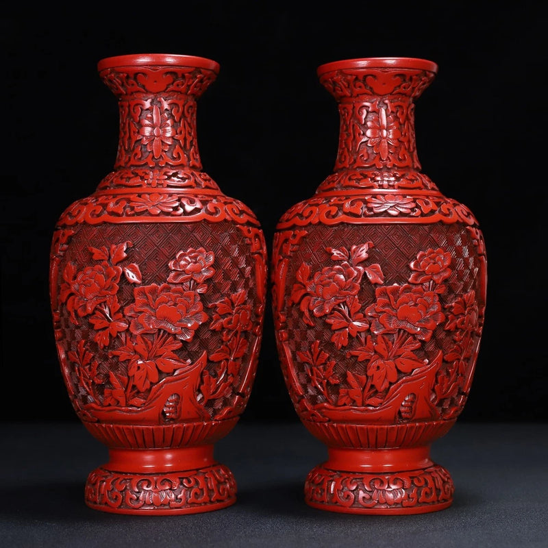 Red lacquer peony relief vase with flared rim and rounded body