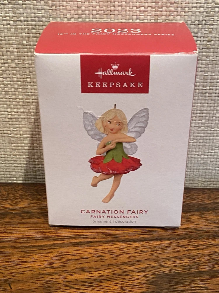 Hallmark keepsake ornament box with red carnation fairy figurine