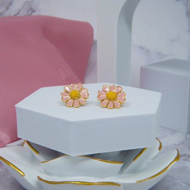 Gold sunflower stud earrings with pink-red enamel petals and yellow center