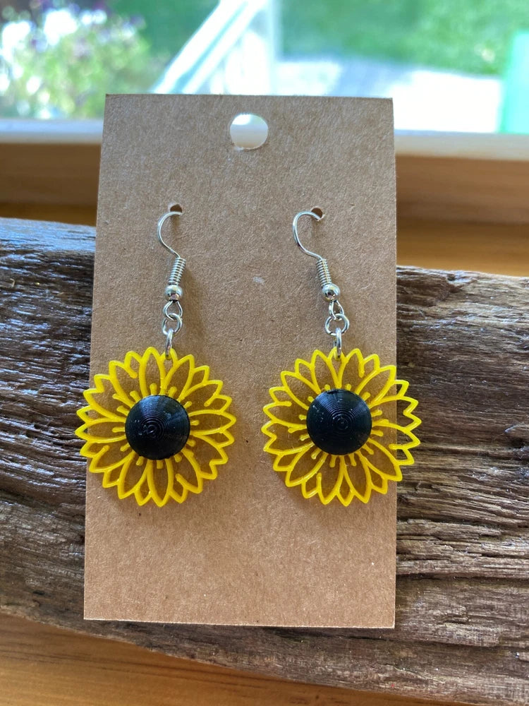 Yellow sunflower dangle earrings with dark centers and open-leaf 3D petals