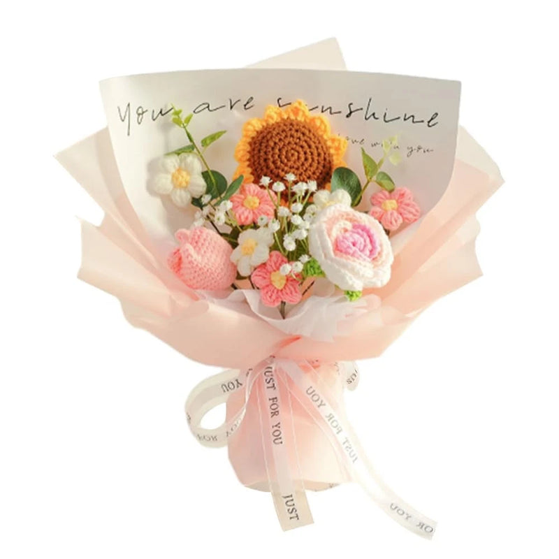 Handmade crochet flower bouquet with sunflower, pink roses, white blooms, and green leaves