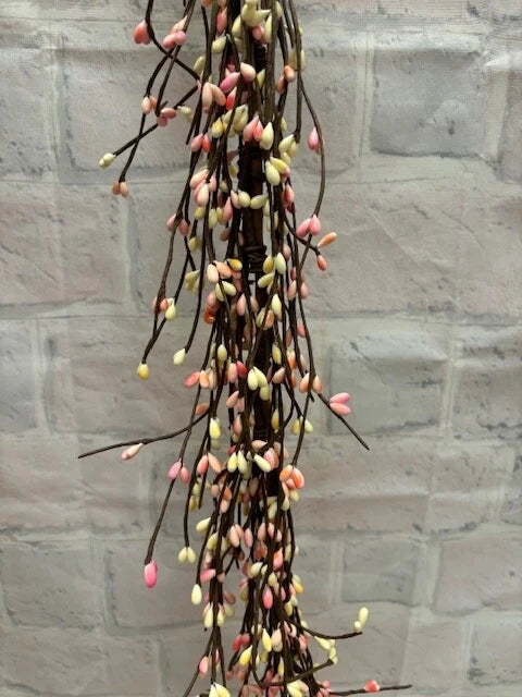 Pink and cream pip berry garland with teardrop berries on dark stems
