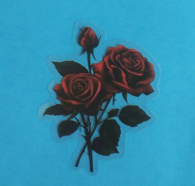 Transparent sticker with red roses and green leaves
