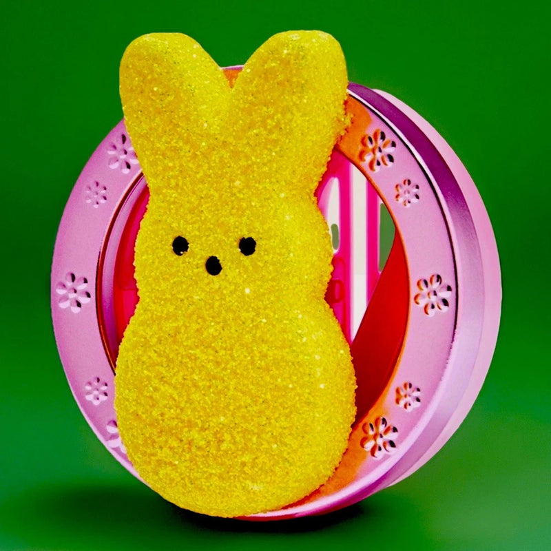 Yellow glitter bunny car visor fragrance holder with pink circular frame and cutouts