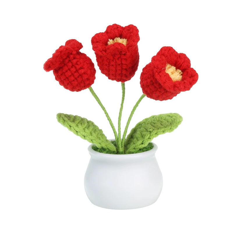 Handmade crochet lily of the valley flowers in small white pot, red blooms