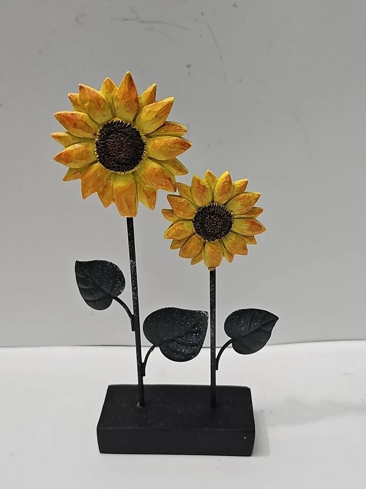 Metal tabletop photo card holder with two yellow sunflower heads, black base and stems