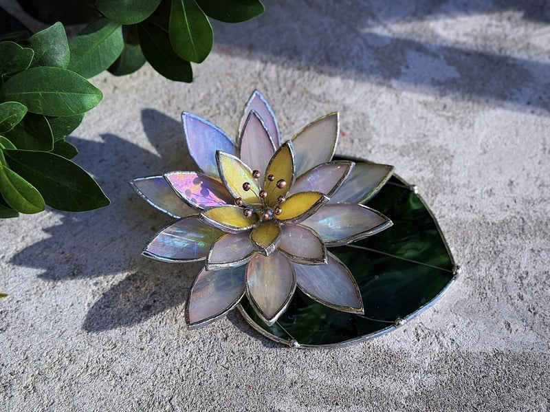 Iridescent stained-glass water lily suncatcher with leaf-shaped frame