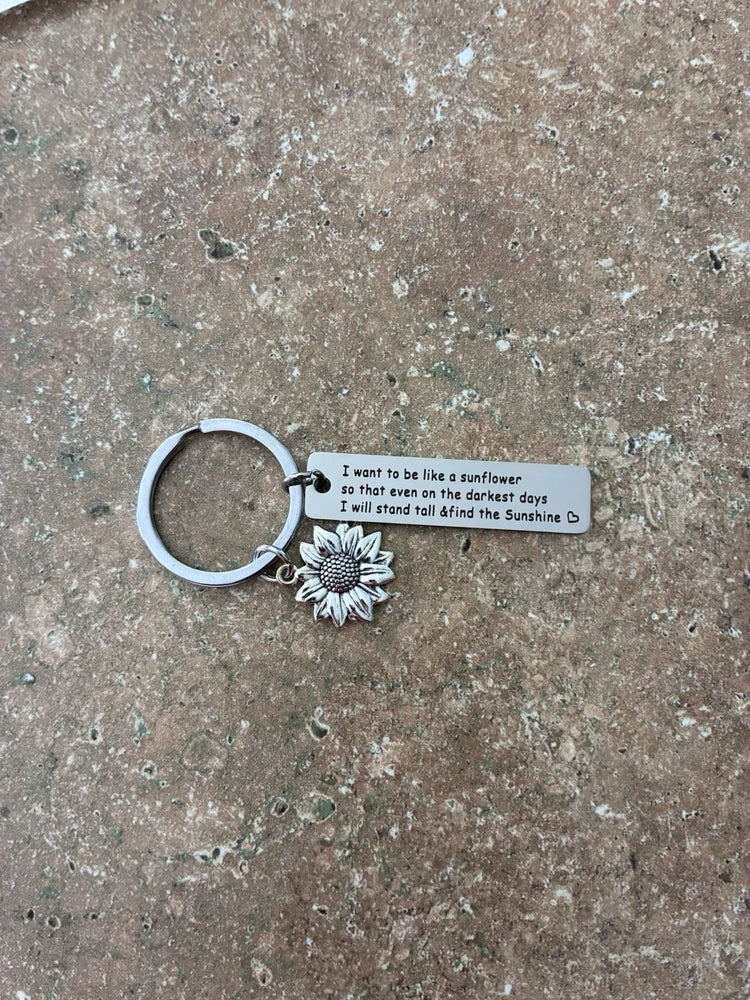 Silver sunflower keychain with round key ring and small engraved message charm