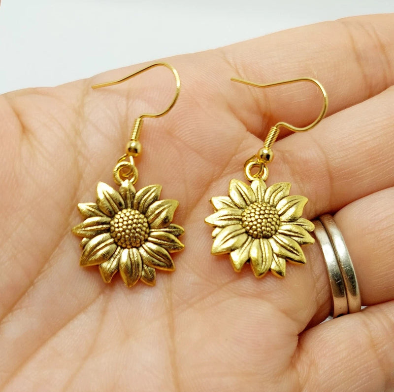 Gold-tone sunflower charm dangle earrings with fishhook stainless steel ear wires