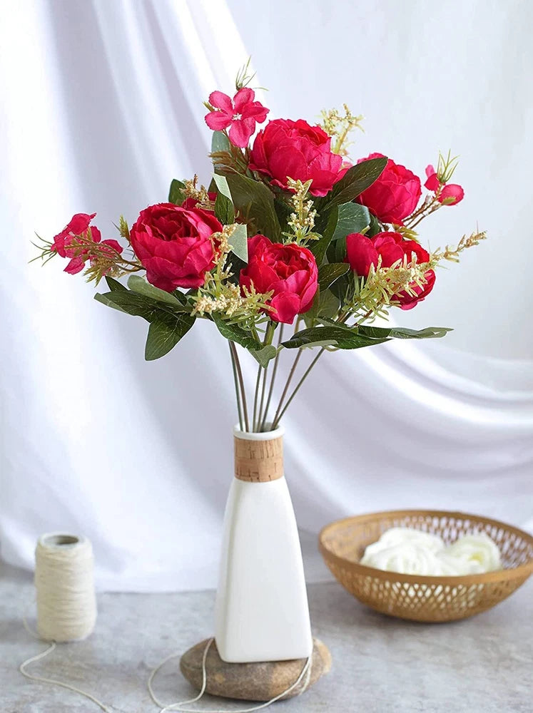 Artificial peony flower stems bunch with red blooms and green leaves