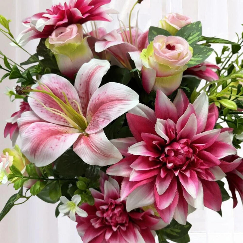 Artificial floral bush with pink and white lily, dahlia, and rose blooms