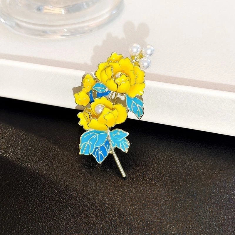 Yellow and blue enamel peony brooch with pearl accents and pin back