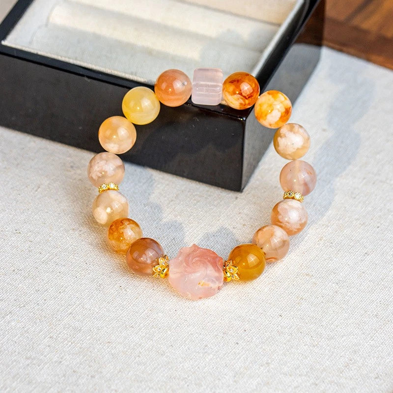Handmade agate bead bracelet with peony flower charm and orange-peach gemstone beads