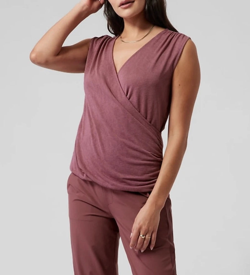 Women’s sleeveless wrap top tank in mauve rose with draped V-neck and crossover front