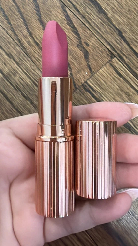 Charlotte Tilbury matte lipstick in rose-pink, rose-gold tube with cap