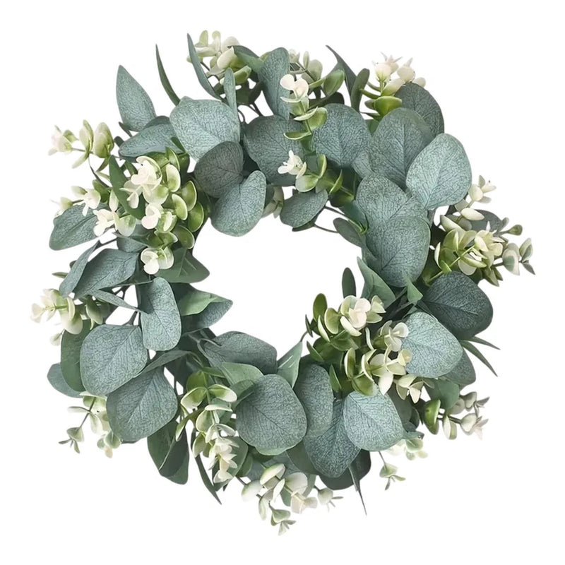 Artificial eucalyptus wreath with faux gray-green leaves and small white flower clusters