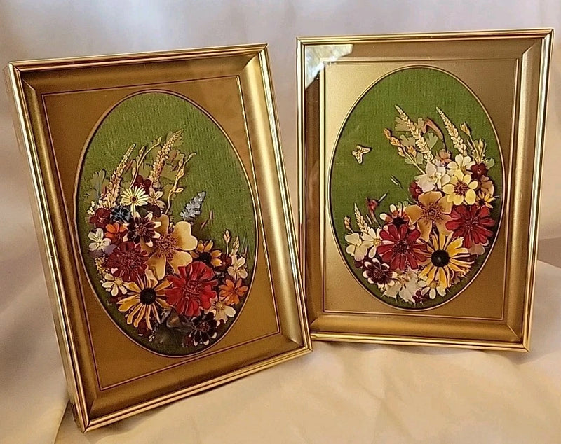 Set of 2 gold-tone shadow box picture frames with oval dried flowers and butterfly design