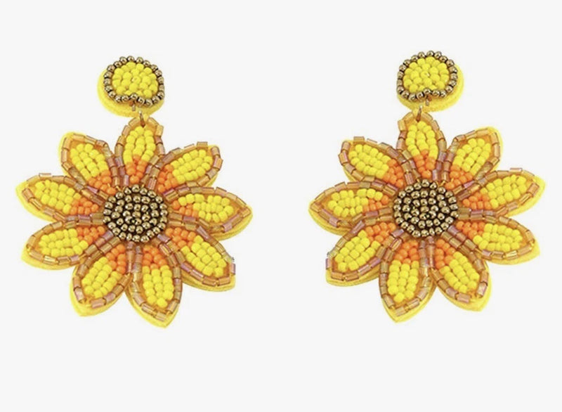 Beaded sunflower dangle earrings with yellow and orange petal beads and gold-toned centers