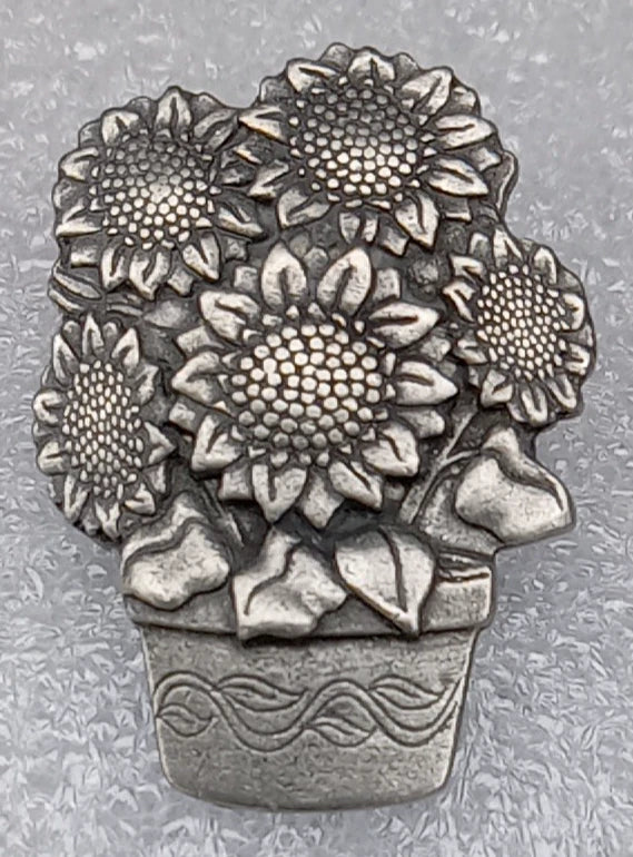 Sunflower flowerpot lapel pin with five detailed metal blossoms and leaf accents