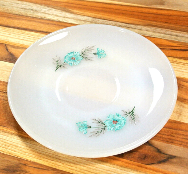 Vintage white tea cup saucer with blue floral pattern