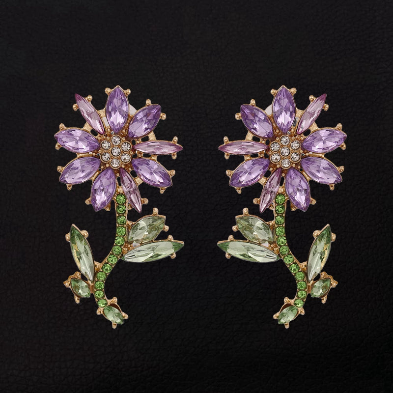 Purple crystal sunflower stud earrings with gold-tone posts and green leaf accents