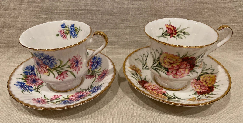 Paragon ribbed teacups and saucers, floral pink and blue with gold trim
