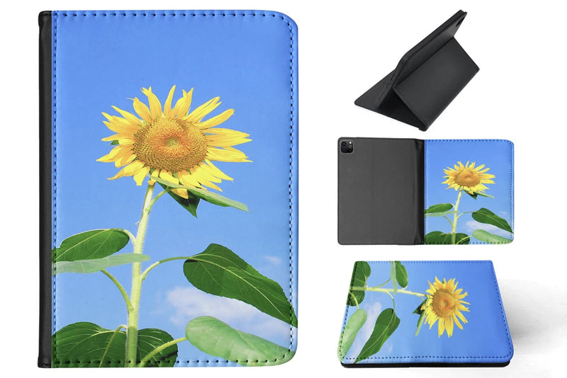 Blue sunflower iPad folio case with stitched edge and card-slot interior, stand view