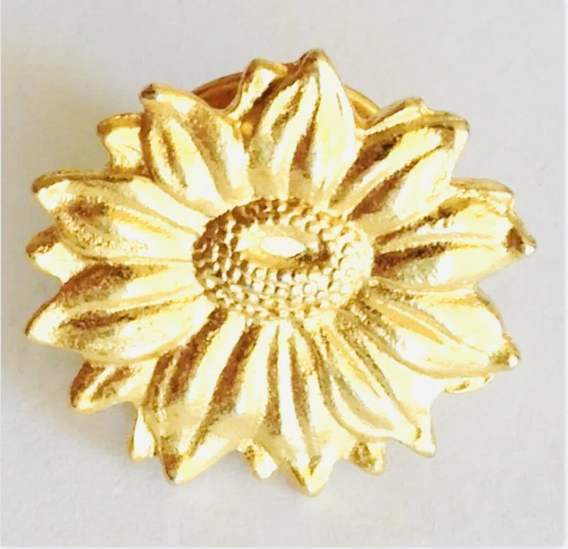 Gold-tone sunflower flower brooch pin with raised center detail