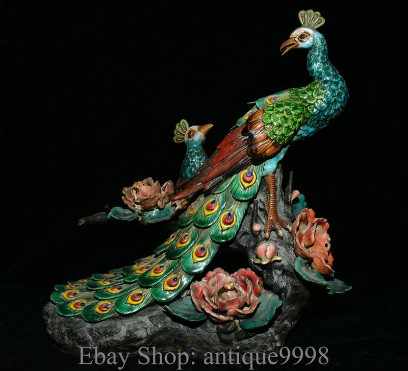 Chinese porcelain peacock sculpture with multicolor tail feathers and peony flowers base