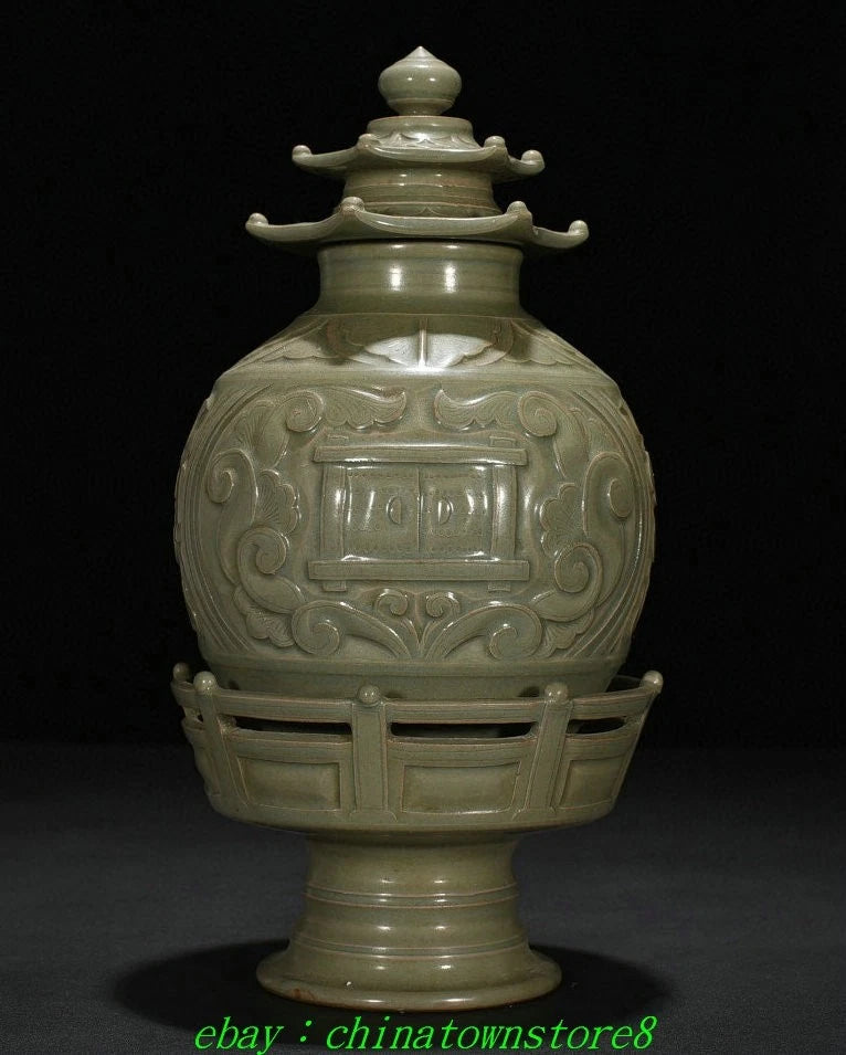 Celadon porcelain stupa jar with tiered lid and carved relief panels