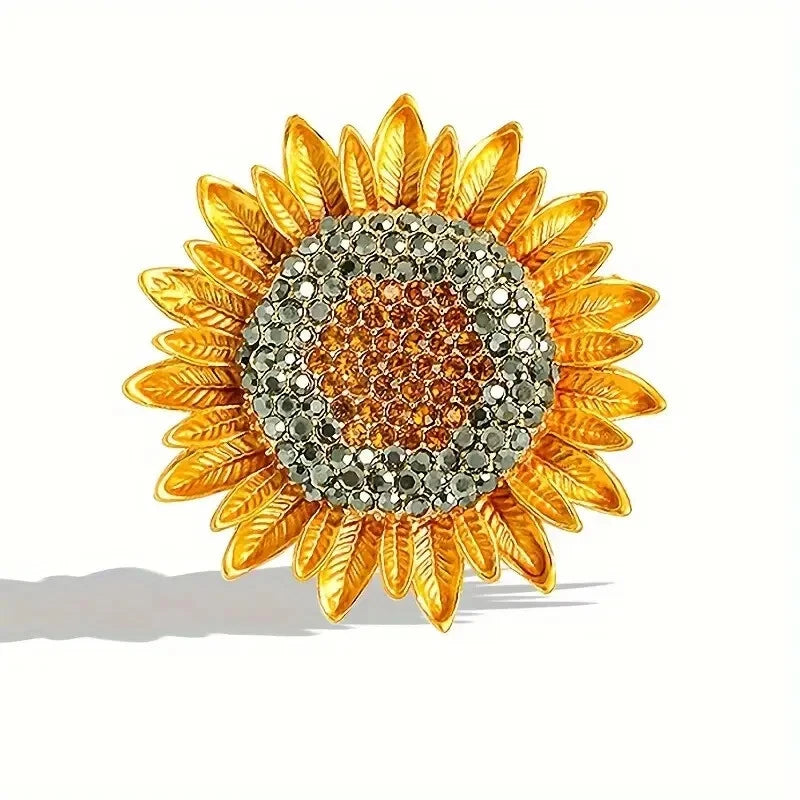 Sunflower rhinestone brooch pin with gold petals and orange crystal center