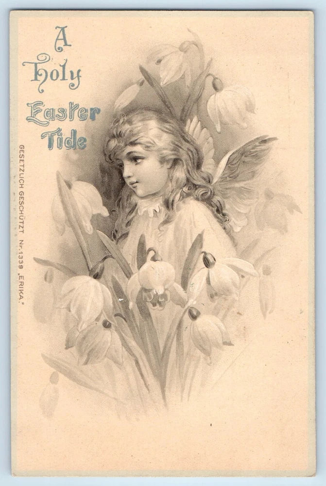 Antique Easter postcard with cherub fairy and lily flowers; 'A Holy Easter Tide' text