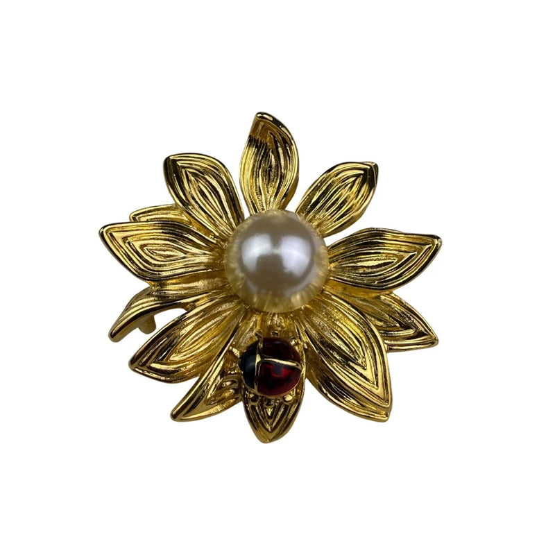 Gold tone sunflower pin brooch with faux pearl center and red accent details