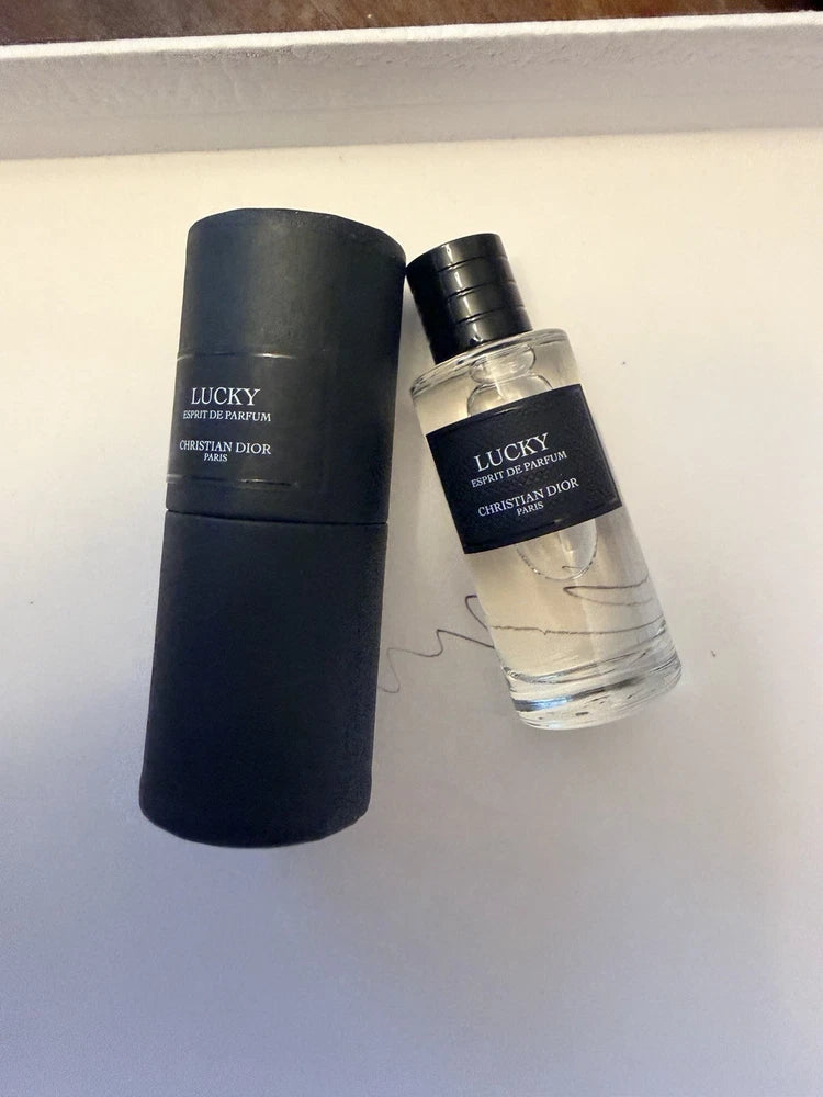 Christian Dior Lucky mini eau de parfum: clear bottle with dark cap and case