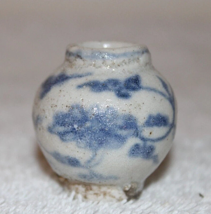 Small ceramic Ming-style vase with blue peony and vine brushwork, round body