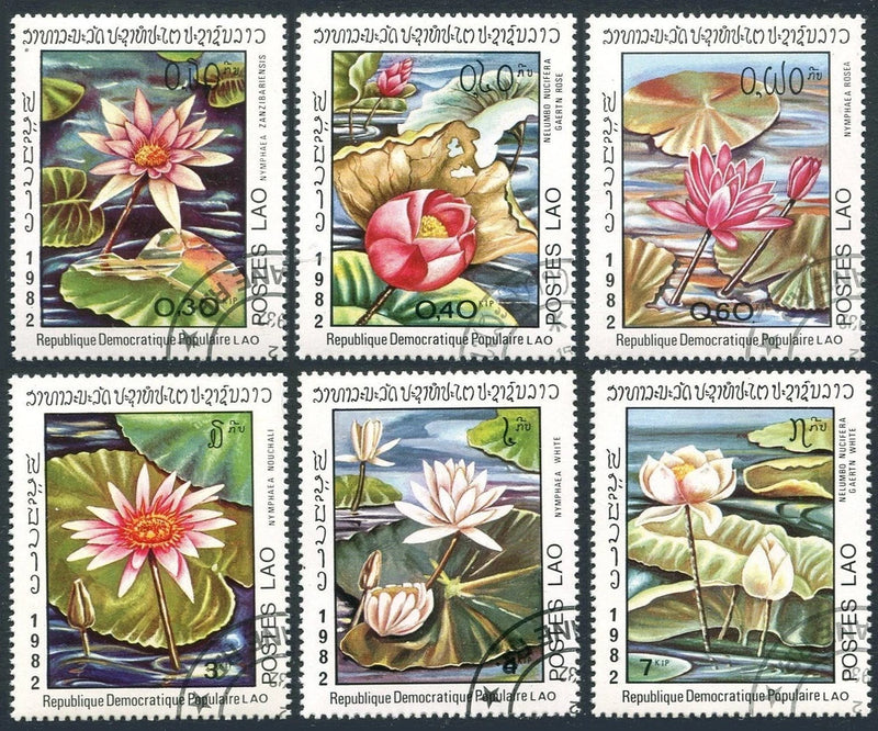 Sheet of postage stamps featuring pink and white water lily flowers and leaves