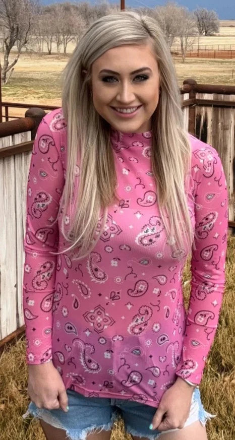 Pink mesh top with paisley bandana print, long sleeves and crew neckline