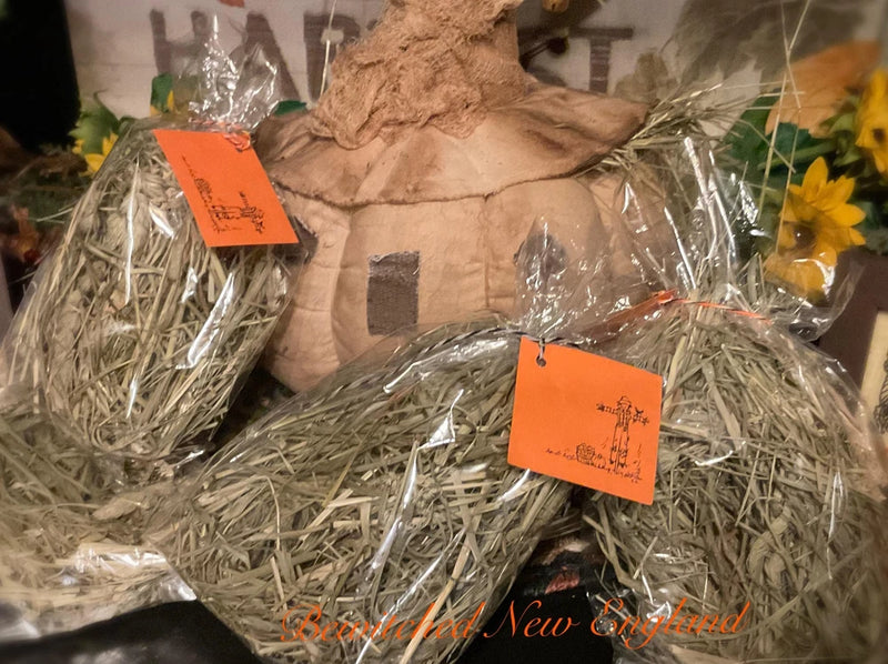 Handmade primitive scarecrow stuffing with dried straw in sealed bags