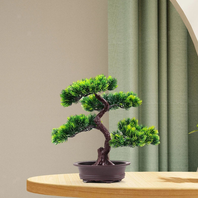 Artificial bonsai tree in dark pot with bright green foliage and twisted trunk