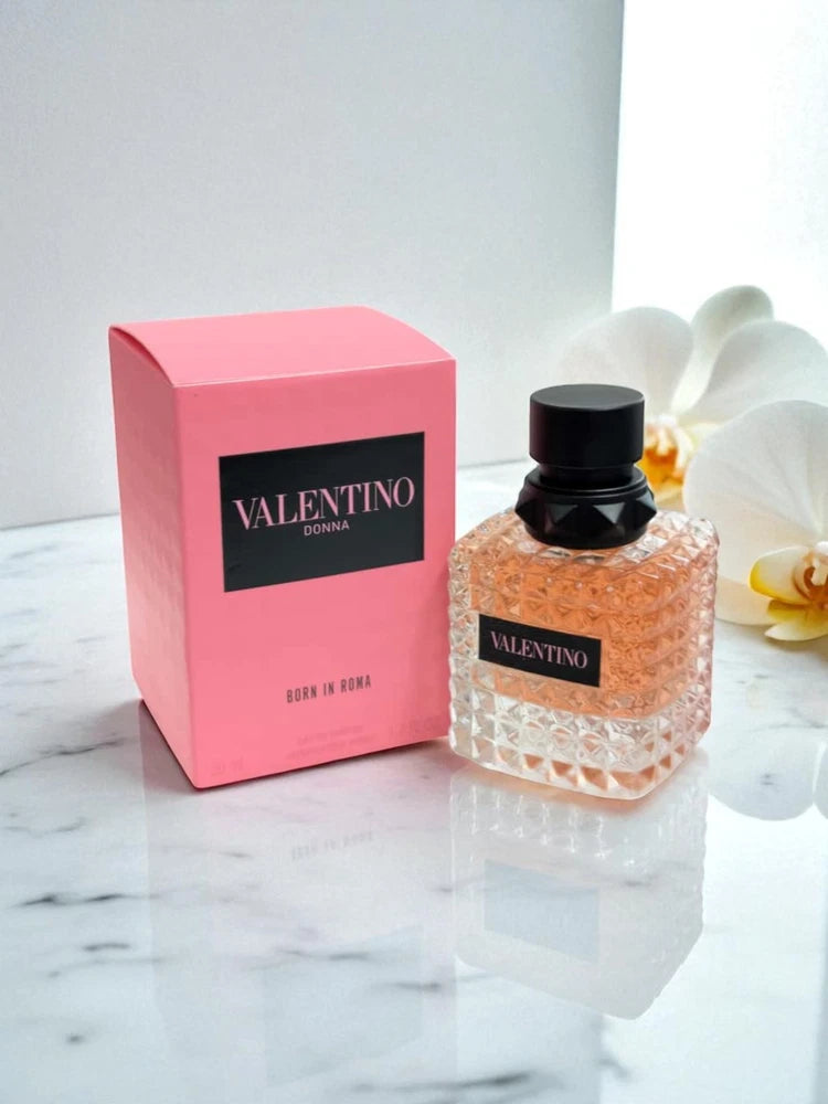 Valentino Donna Born in Roma eau de parfum bottle with black cap, in pink gift box