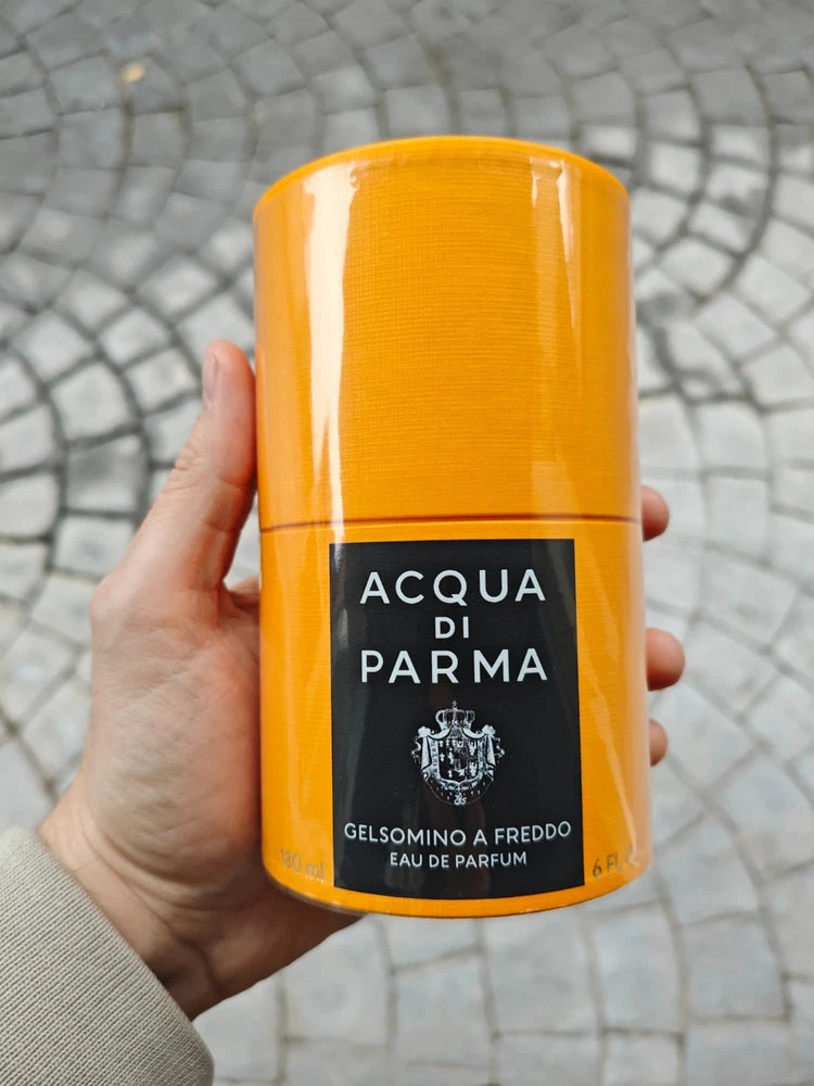 Acqua di Parma orange perfume bottle with black label