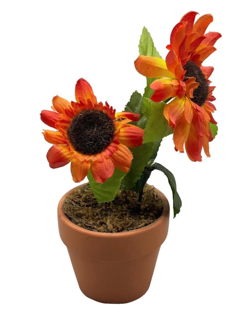 Artificial potted sunflower planter with orange blooms and green leaves in terracotta pot